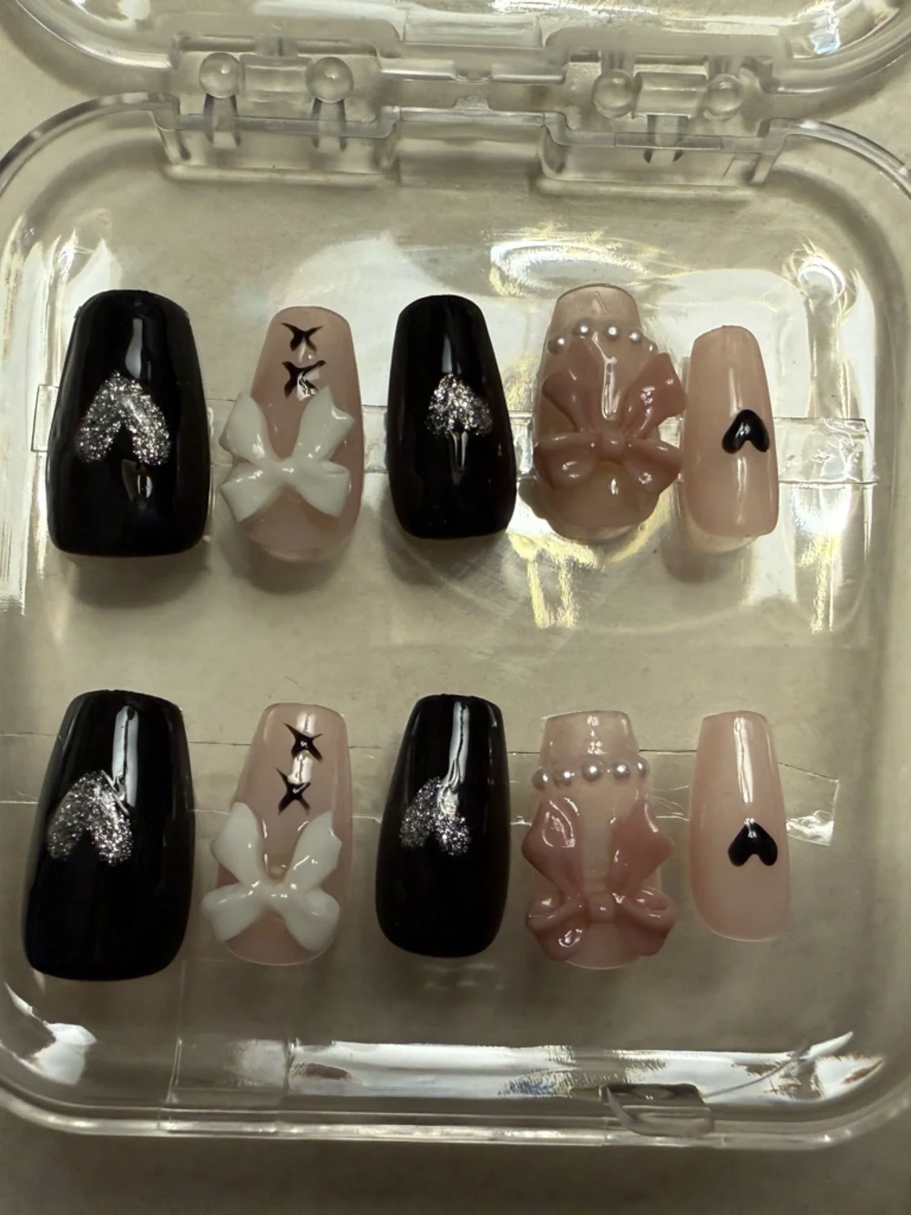 Black and Nude Press-On Nails with Silver Accents